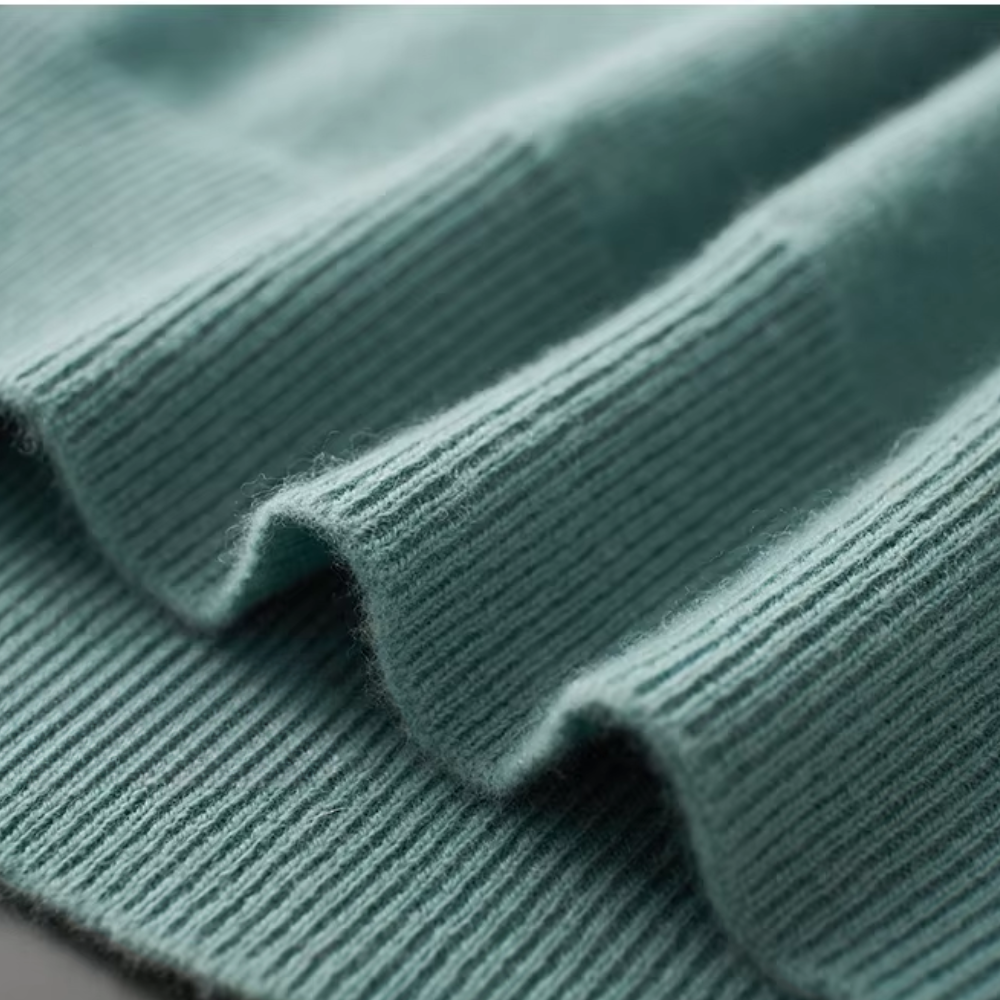 Aureo Madrid™ | Jersey de lana con cuello en V